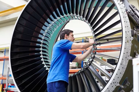 A picture of a worker in a manufactory